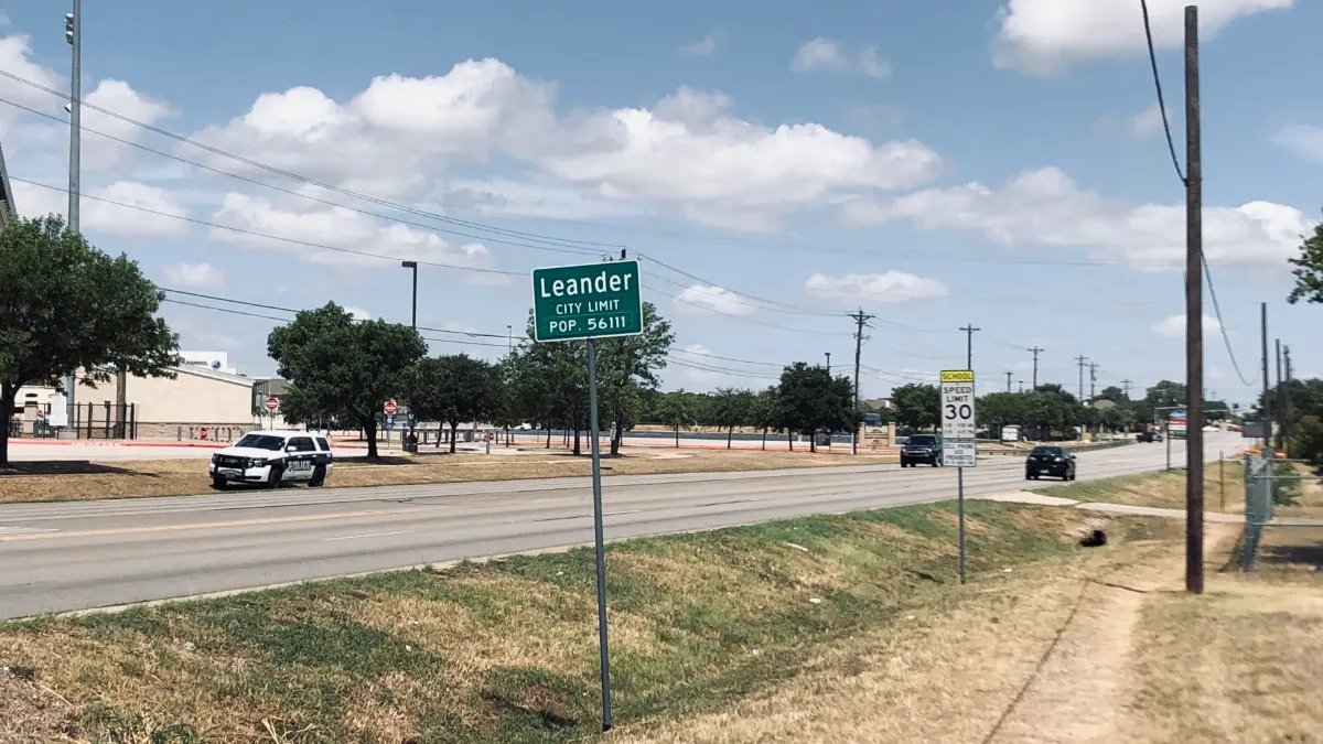 Leander, Texas city limit sign on the highway into town